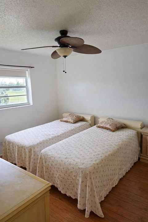 Cozy twin bedroom with natural light