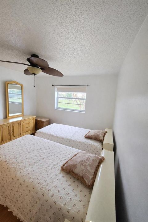 Peaceful twin bedroom with natural light