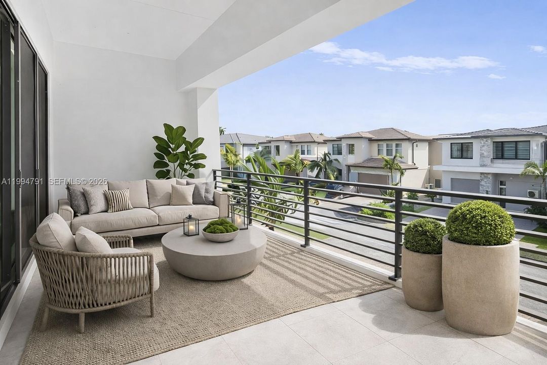 Virtually staged balcony off bedroom 2 facing east for sunrise