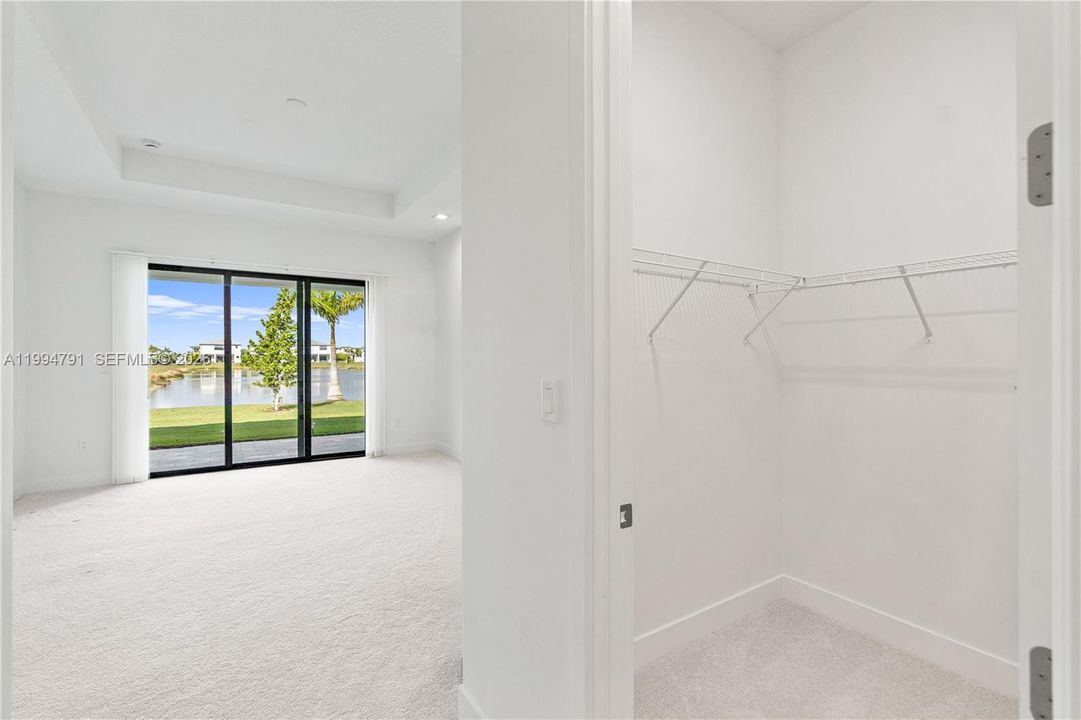 Primary walk-in closet 2 of 2
