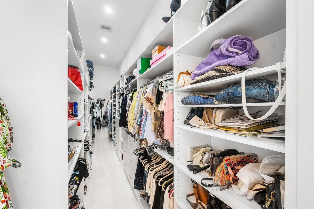 Primary Bedroom walk in closet