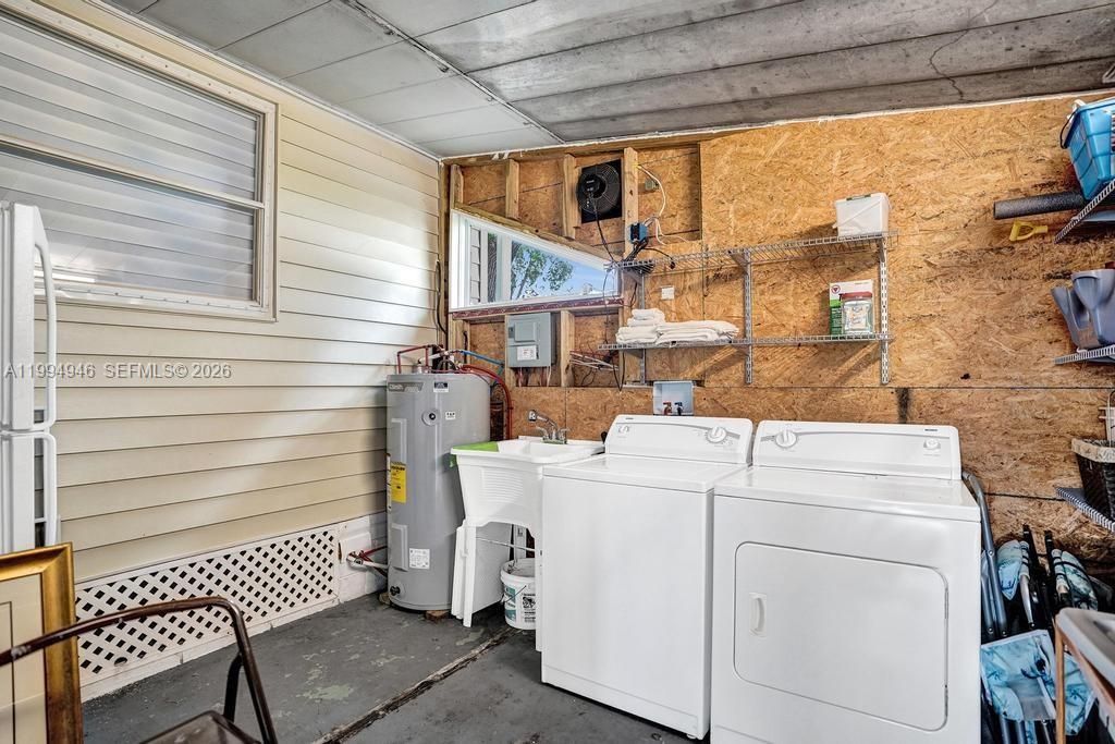great Laundry and storage area adjacent to florida room
