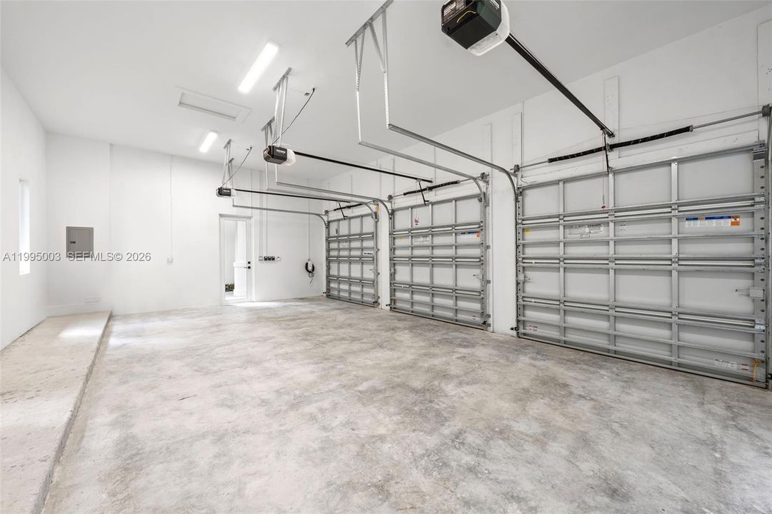 2 nd 3 car garage  Total 6 car garages , all se3t up for electric cars