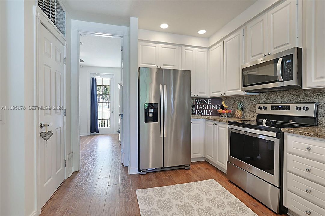 Generous cabinet and counter space.