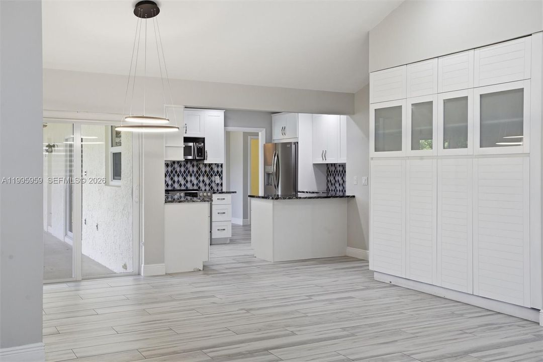 Kitchen from Family Room - Notice Wall Unit at Right