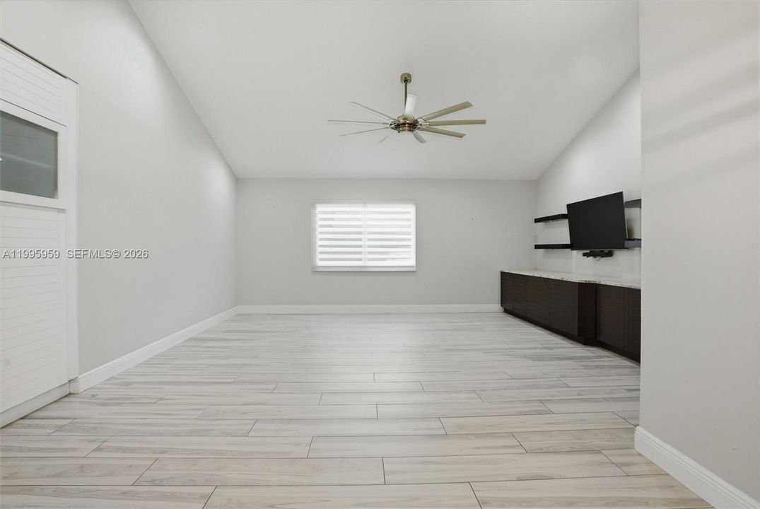 Family Room with Wall Fixtures on Left & Right
