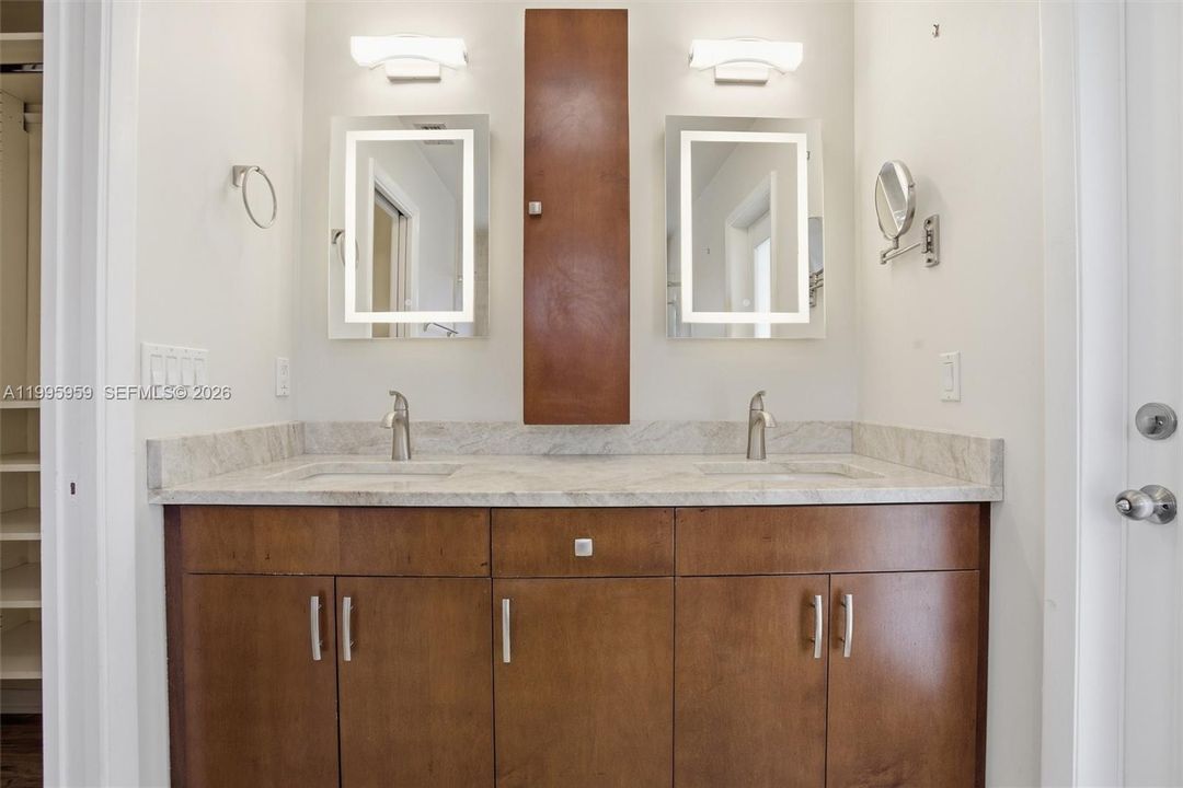 Master Bath with Dual Sinks and Modern Finishes