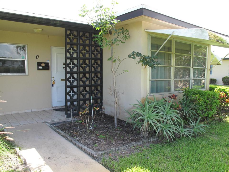 Front view of corner villa and entrancew