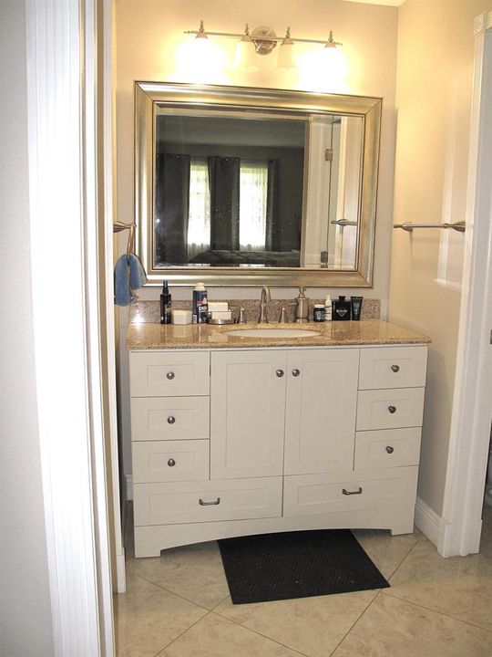 Primary bathroom and closet (2)