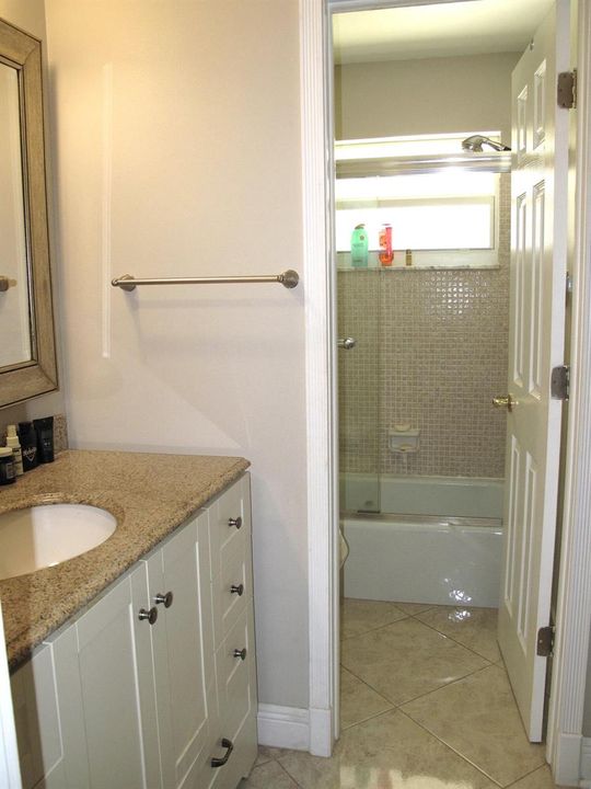 Master bathroom with condo tub shower (2