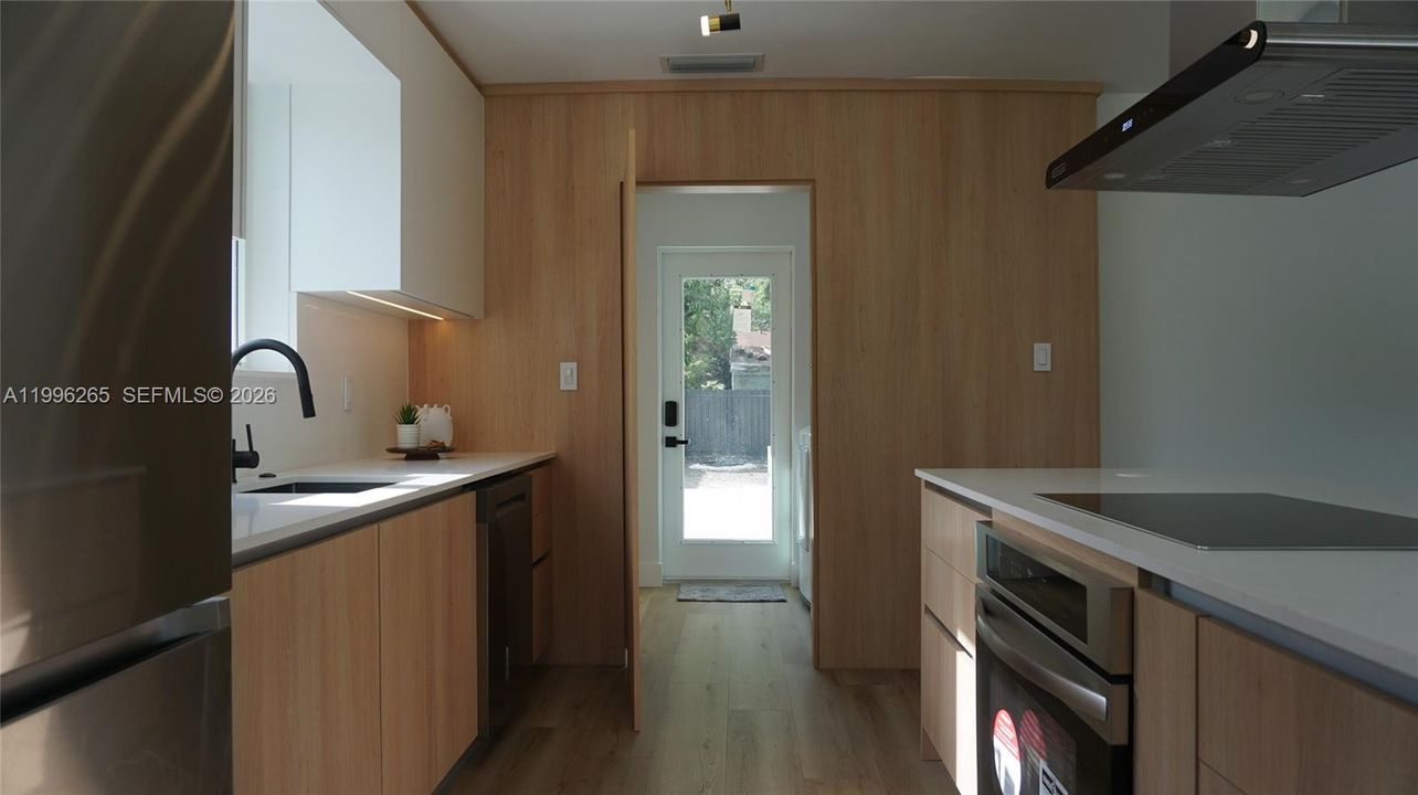 Kitchen to Laundry Room