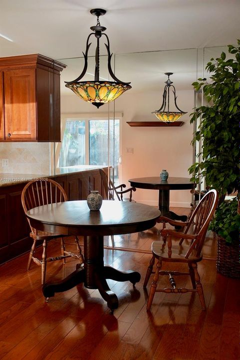 Wood floors and floor to ceiling mirrors