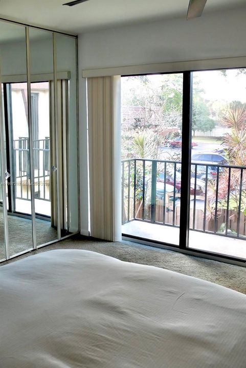 Balcony primary bedroom; Hurricane impact slider