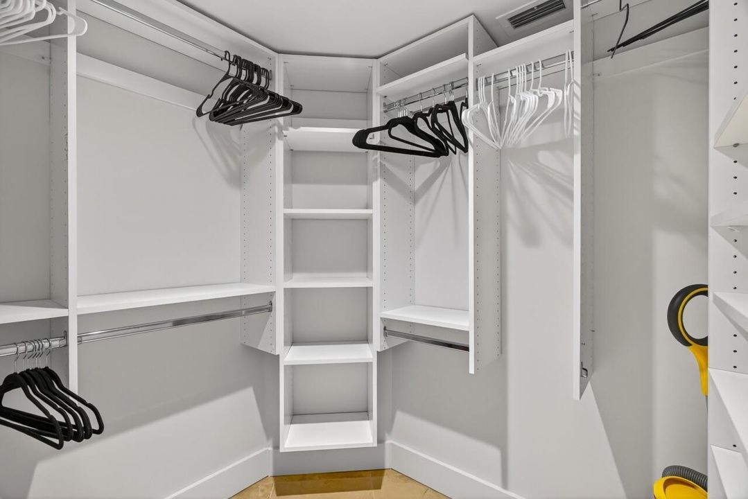 PRIMARY BEDROOM WALK IN CLOSET