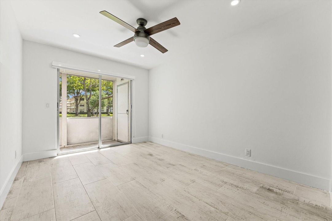 Primary Bedroom with Sliders to Patio