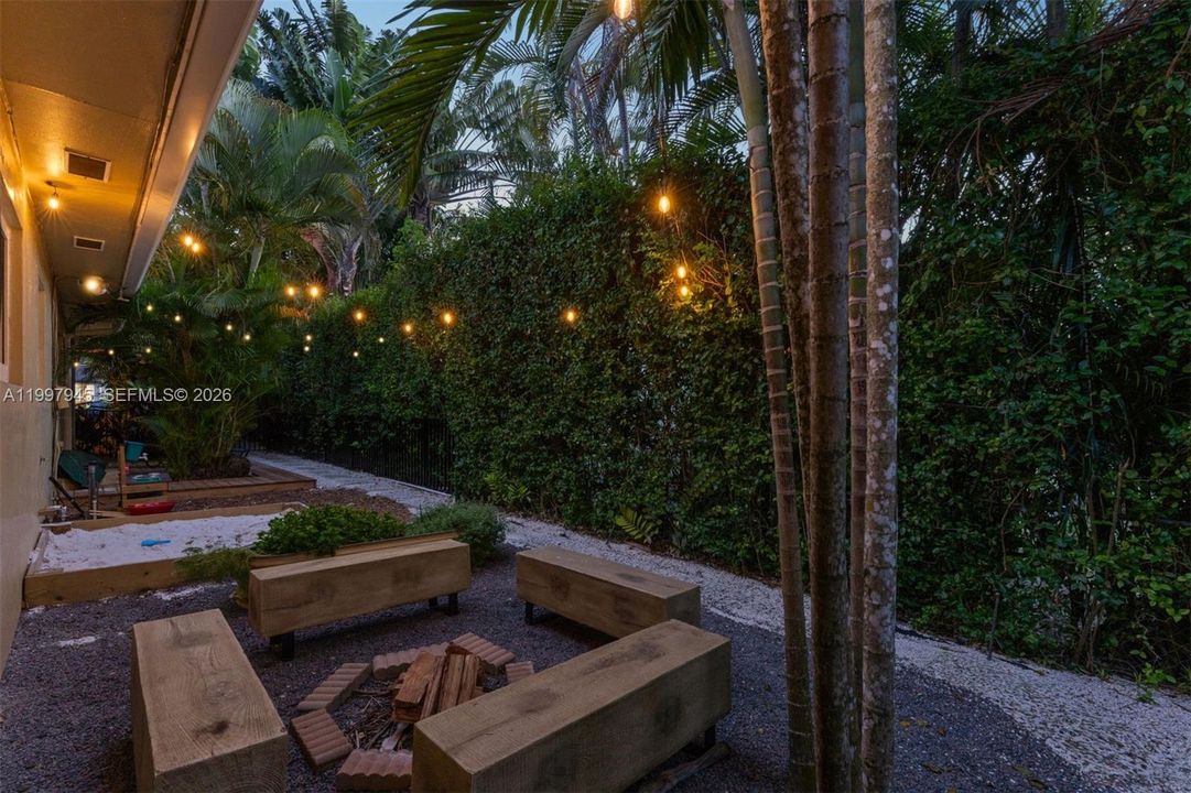 Side yard with fire pit
