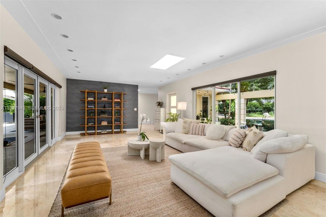 Sun-drenched living room through skylights