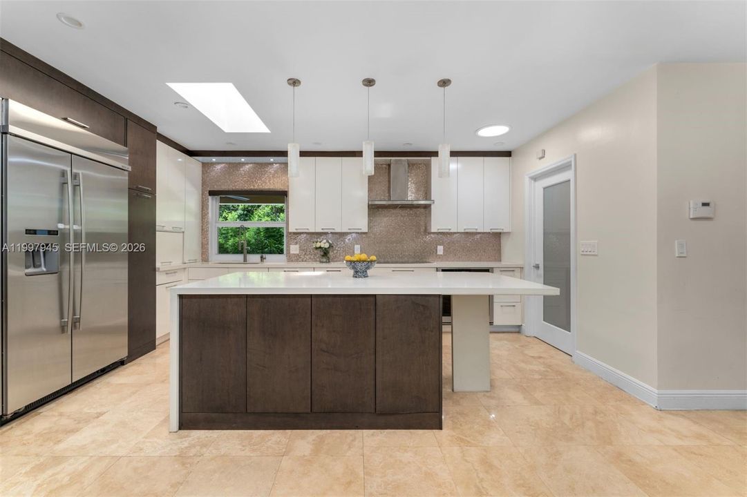 Open and modern with pass through bar