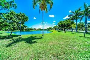 VIEW OF LAKE AND YARD