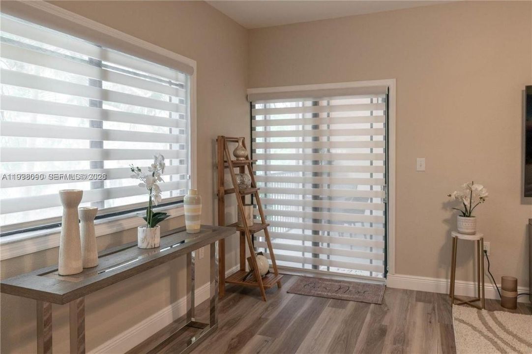 Main living area with great natural lighting and access to private screened in balcony