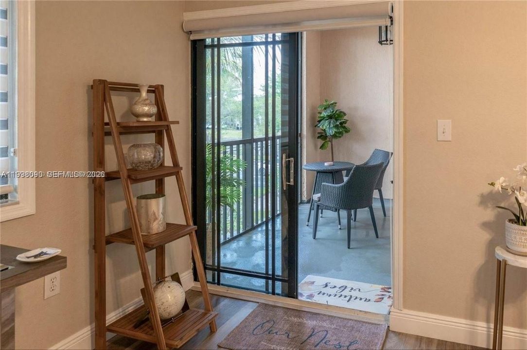 Access to private screened in balcony from main living area