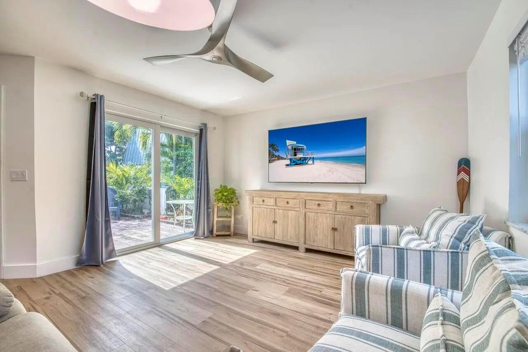 Living Room with Glass Doorsm (Staged)