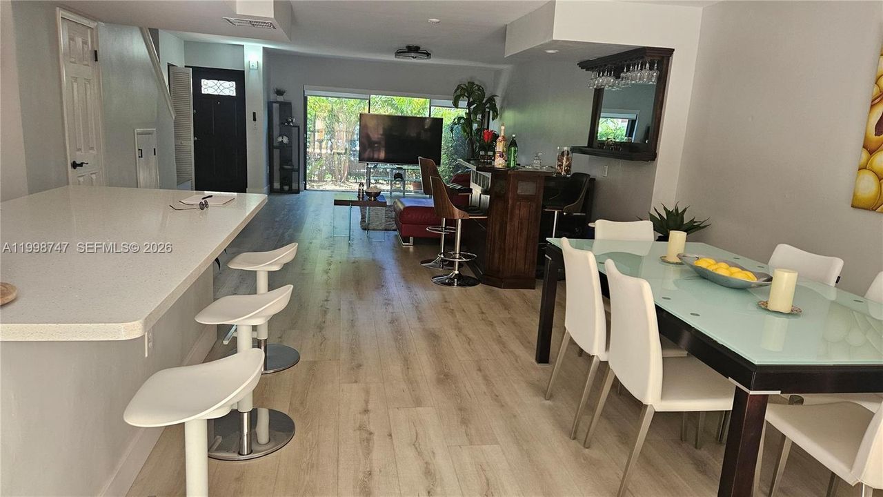 View from dining area, bar and living room