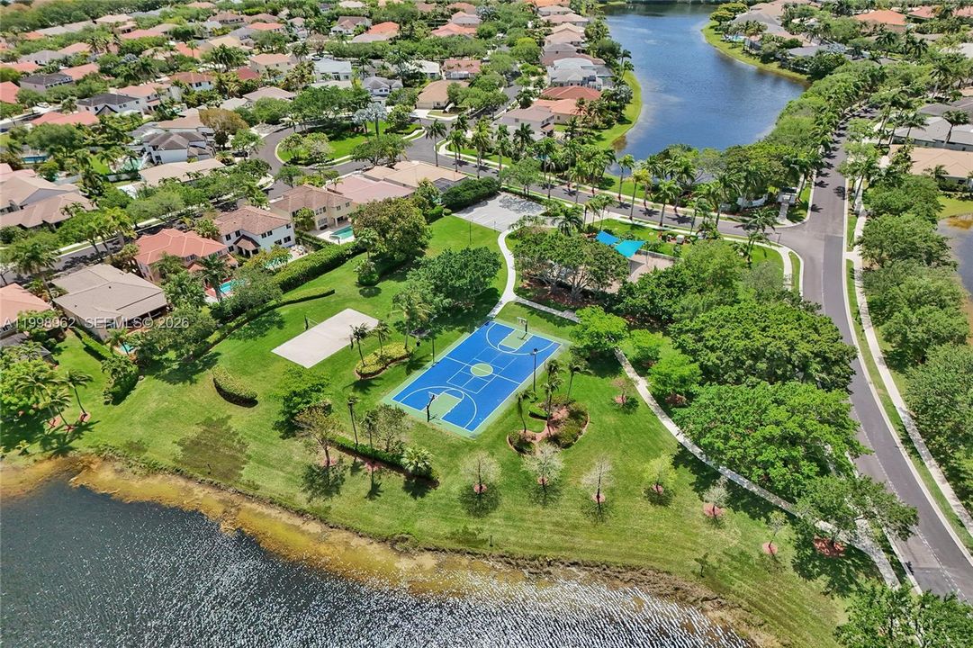 Community basketball court, volleyball court and playground.