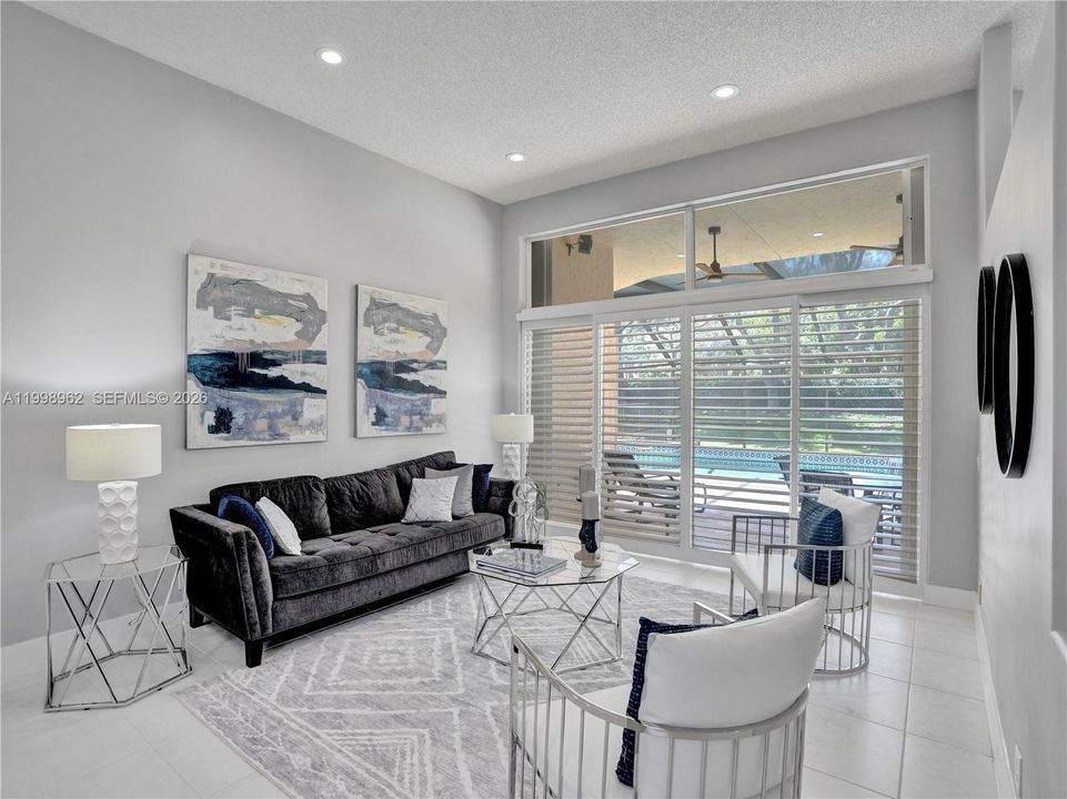 Light and bright living room with LED lights throughout the home