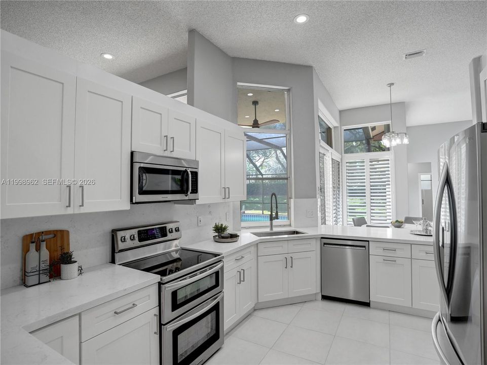 Renovated kitchen with quartz countertops