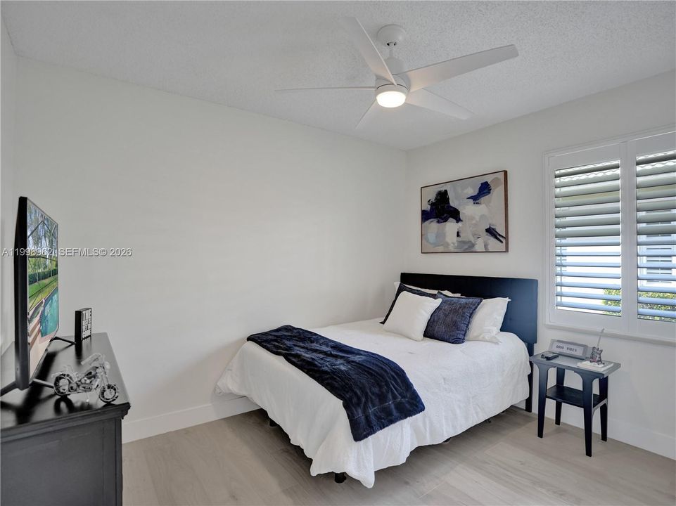 3rd bedroom, freshly painted, new flooring and baseboards, custome closets