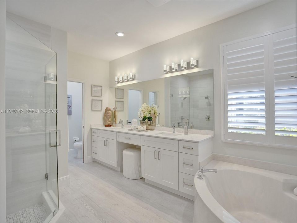 Renovated master bathroom and custom cut-out niche in shower