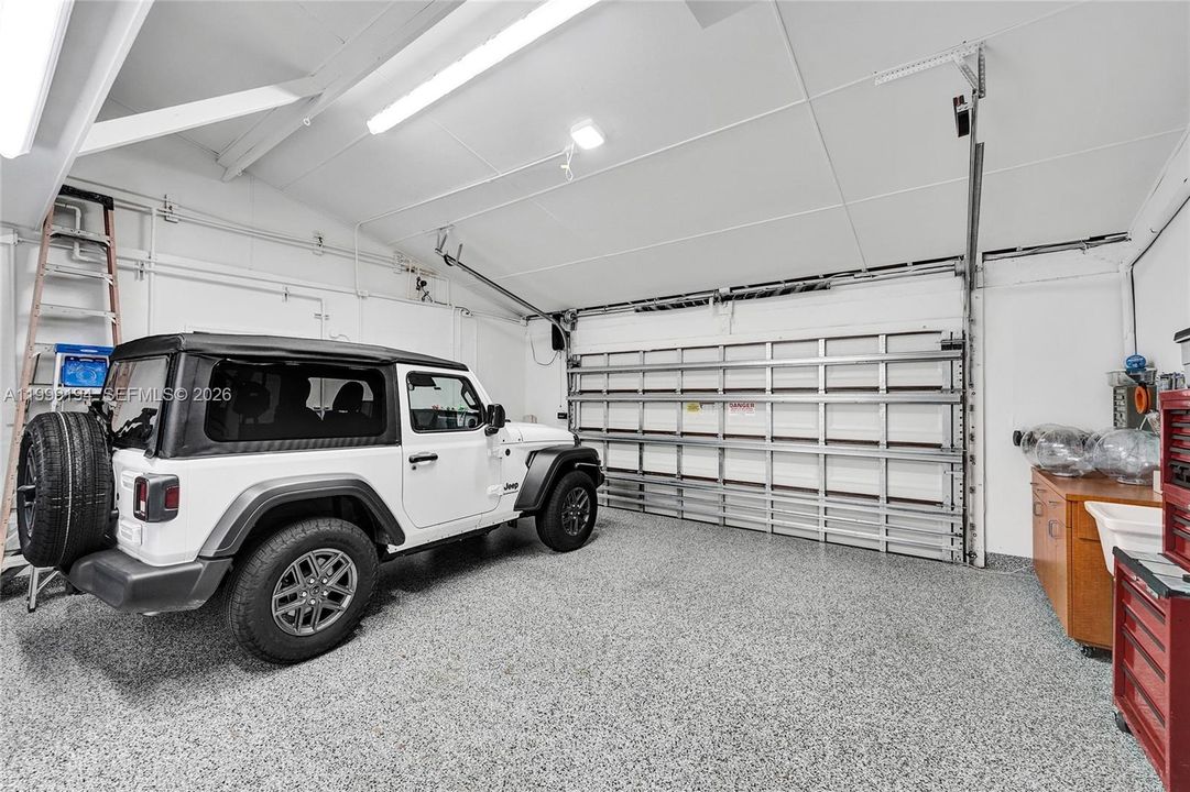 Wall mount door opener with volume ceilings