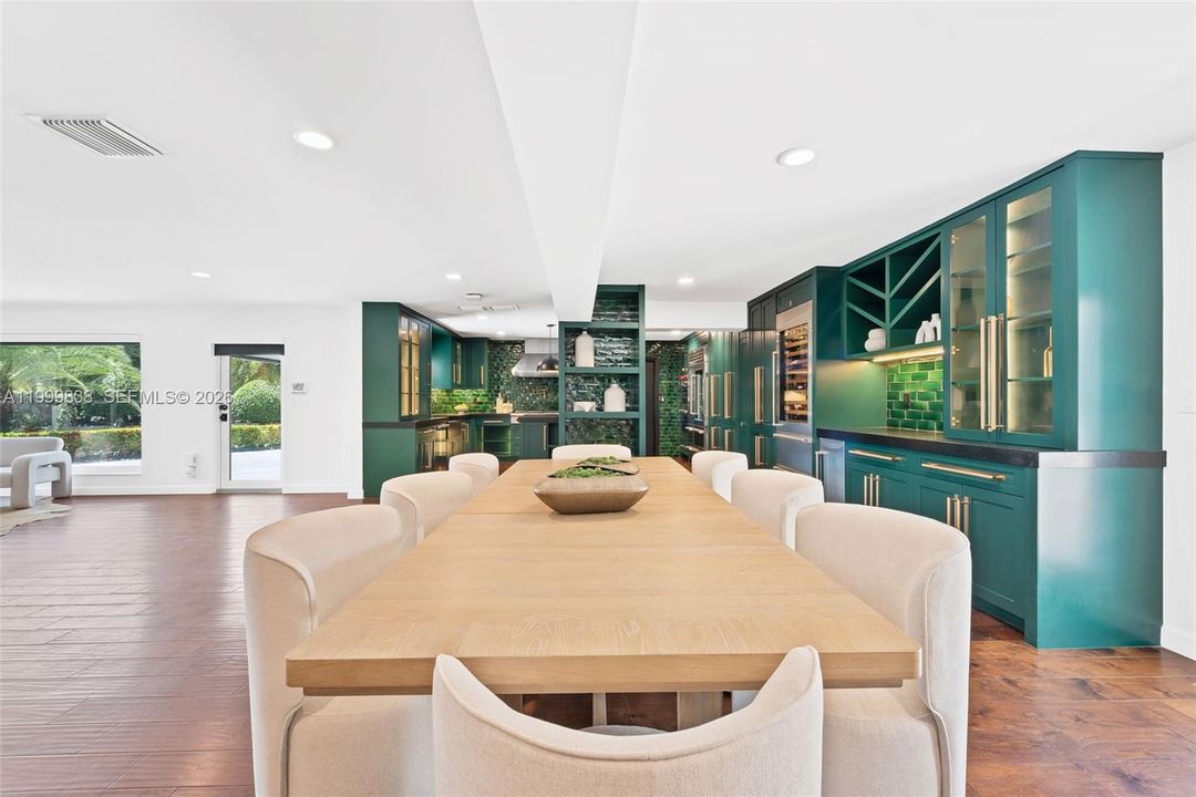 Dining area with views to expansive custom chef's kitchen