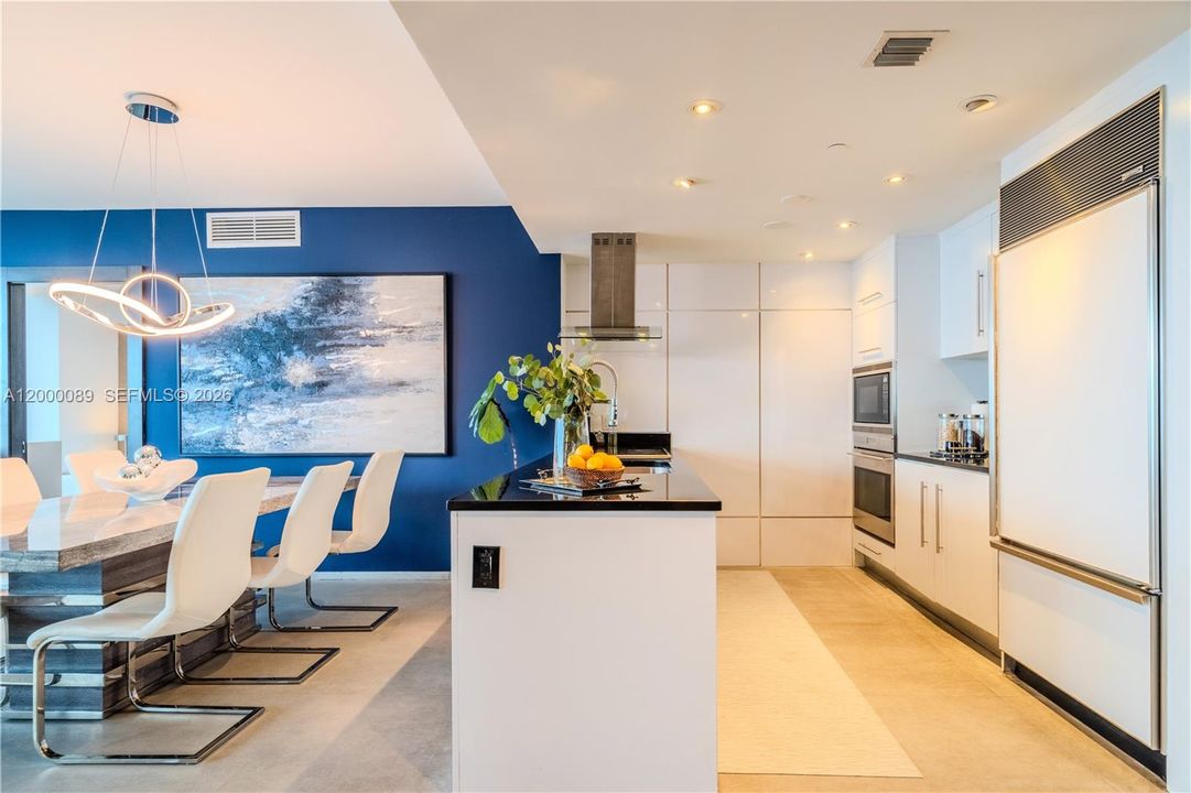 Modern kitchen with Wolf oven, built-in Subzero fridge and Bosch appliances