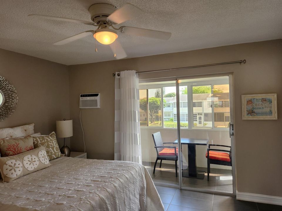 Elegant Bedroom leads to enjoyable balco
