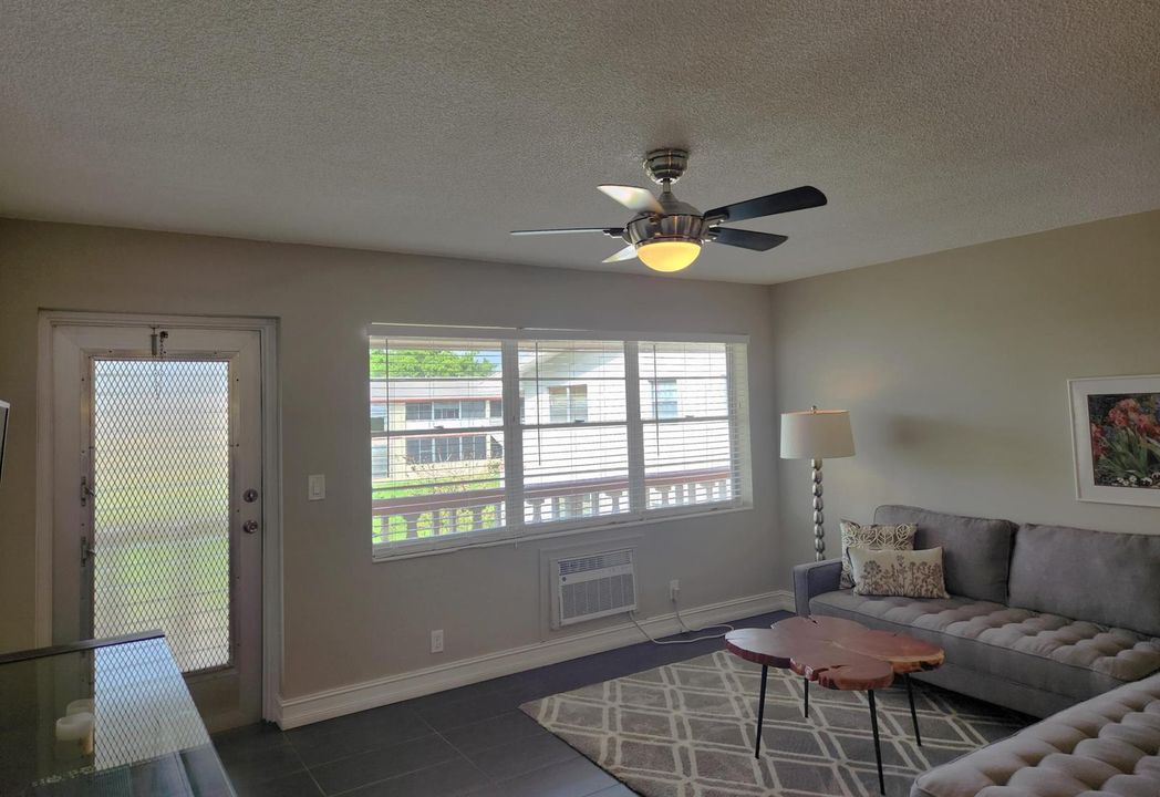 Living room with great windows to let in