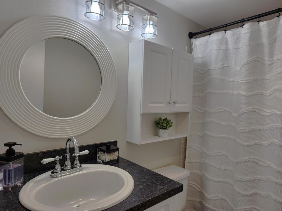 Stylish bathroom with elegant shower cur