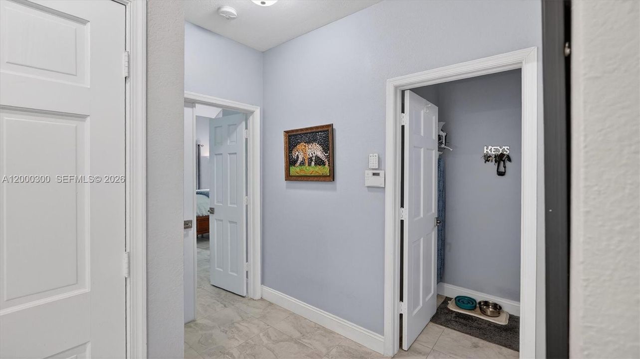 to the master, laundry room, garage & half bath