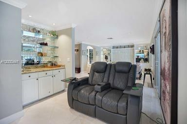 Built-in bar with granite countertop.
