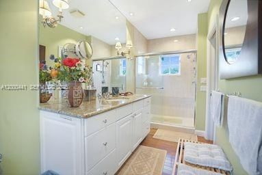 En suite bath for downstairs primary suite.