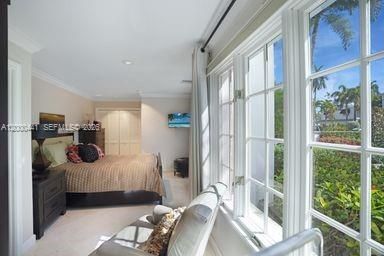 Light, bright bedroom 2 with offcie area.