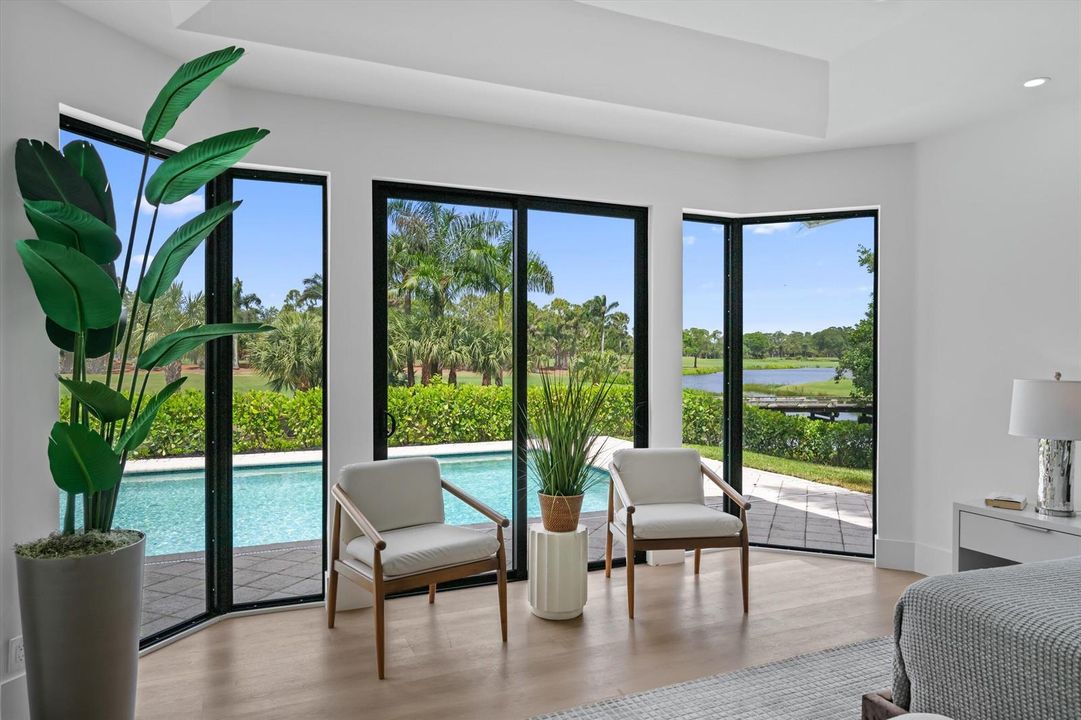 Sitting area overlooking pool