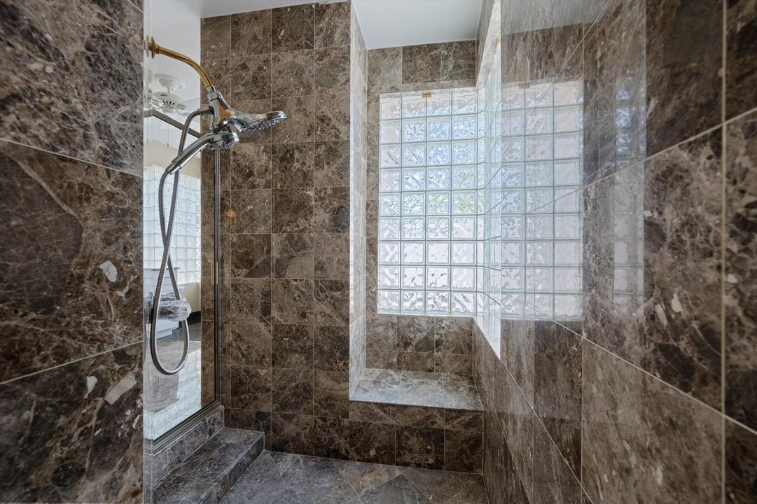 Primary Shower with dual entrances