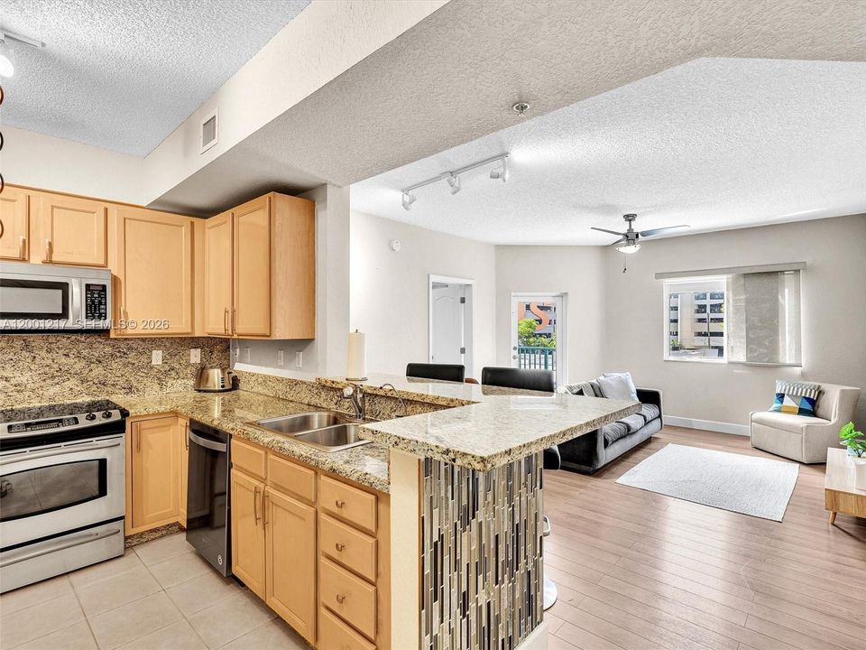 Granite Counters, Wood Cabinets, SS Appliances