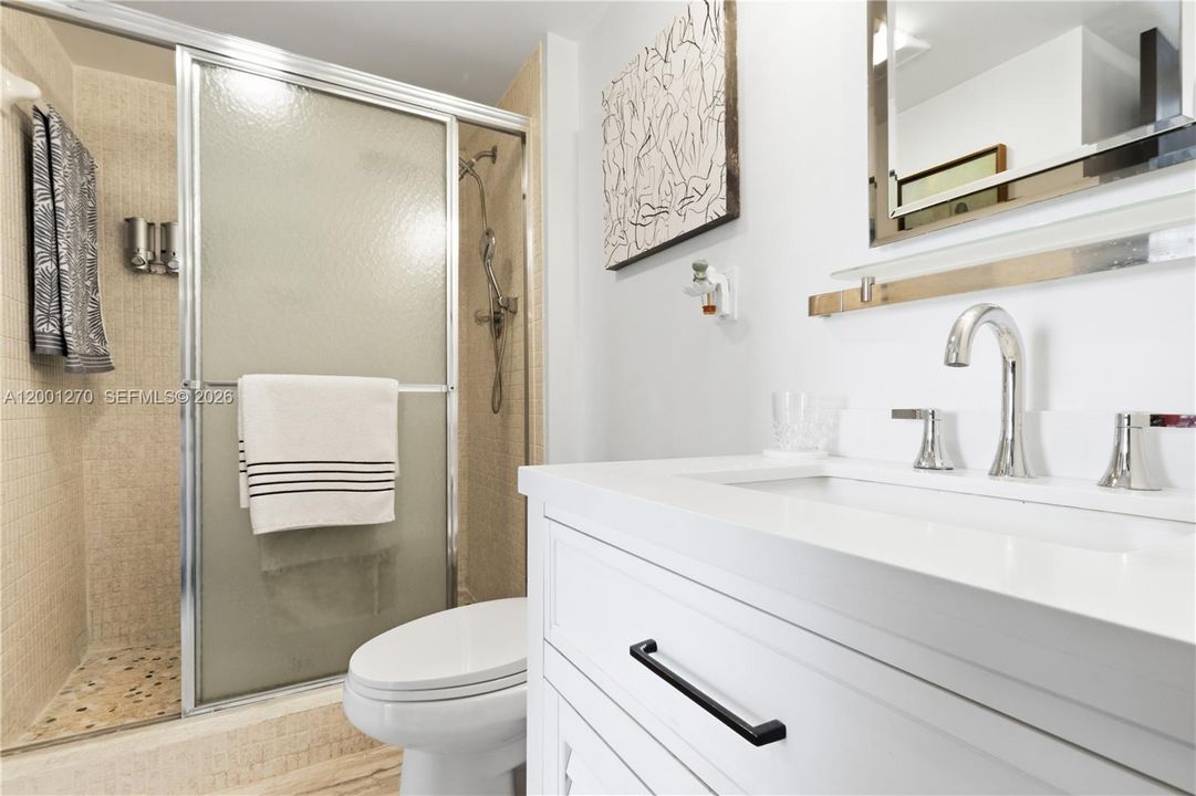 Clean,well-maintained bathroom with stylish finishes.