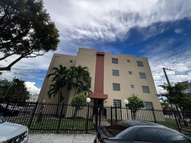 GATED BUILDING WITH REMOTE CONTROL ACCESS AT GATE