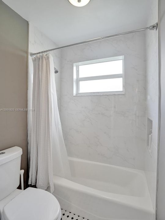 Separate shower/tub and private water closet!