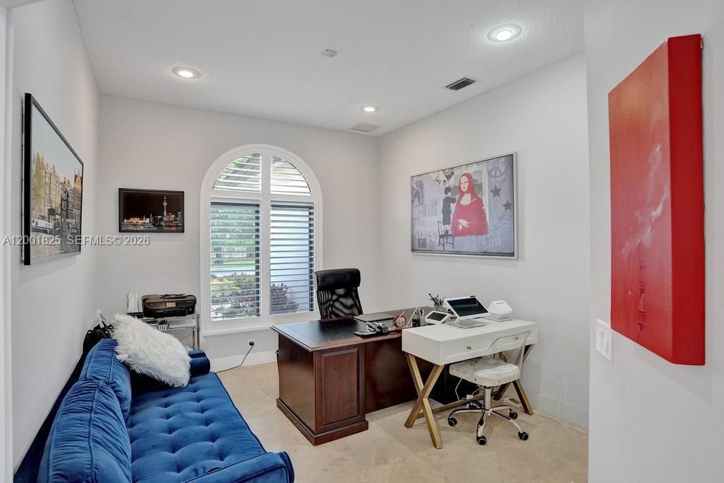 Off of the primary bedroom is used as a office!