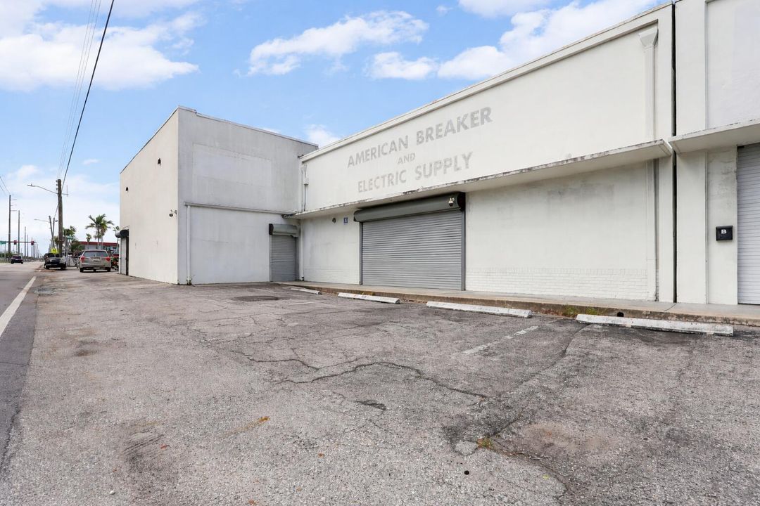 Faded industrial storefront on weathered